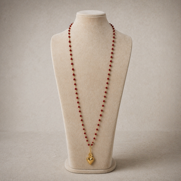 Coral bead necklace and ex voto heart